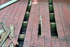 Deck repair before pressure washing and staining.